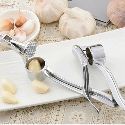 Stainless Steel Handheld Garlic Press – Crusher, Mincer, and Grinder Kitchen Tool trendmeg